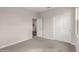 Bedroom featuring natural light, carpet, sliding closet and doorway at 4925 W Beryl Ave, Glendale, AZ 85302