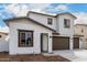 Lovely two-story home showcasing a modern exterior, brown window trim, and a tile roof at 4925 W Beryl Ave, Glendale, AZ 85302