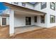 Stylish covered patio with a sliding glass door and window openings to allow lots of natural light at 4925 W Beryl Ave, Glendale, AZ 85302