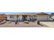 Ranch style home with desert landscaping and two-car garage at 9427 W Garnette Dr, Sun City, AZ 85373