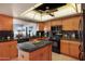 Spacious kitchen with ample cabinetry, granite countertops and breakfast bar at 9650 N 18Th St, Phoenix, AZ 85020