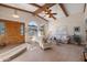 Bright living room with arched windows and wood beams at 9650 N 18Th St, Phoenix, AZ 85020