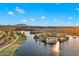 Community boasts a serene lake, lush landscaping, and inviting atmosphere at 18849 E Azalea Dr, Queen Creek, AZ 85142