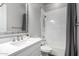 Bathroom with white vanity, quartz countertop, and shower/tub combo at 18849 E Azalea Dr, Queen Creek, AZ 85142