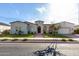 Single-story home with stucco exterior, landscaped yard, and attached garage at 18849 E Azalea Dr, Queen Creek, AZ 85142