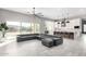 Spacious living area with a large sectional sofa and plenty of natural light at 18849 E Azalea Dr, Queen Creek, AZ 85142