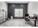 Home office with ample workspace and natural light at 18849 E Azalea Dr, Queen Creek, AZ 85142