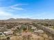 Luxury home with distant mountain views and surrounding neighborhood at 24002 S 201St Ct, Queen Creek, AZ 85142
