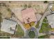 Luxury home with circular driveway and manicured landscaping at 24002 S 201St Ct, Queen Creek, AZ 85142