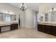 Spacious Primary bathroom with and vanities and a large walk-in shower at 24002 S 201St Ct, Queen Creek, AZ 85142