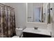 Clean bathroom with vanity, toilet, and shower/tub combo at 24002 S 201St Ct, Queen Creek, AZ 85142