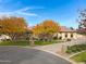 Beautiful stone and stucco house with autumn trees at 24002 S 201St Ct, Queen Creek, AZ 85142