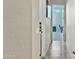 Long hallway with tile flooring and access to other rooms in the house at 24002 S 201St Ct, Queen Creek, AZ 85142