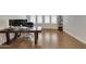 Home office with wood desk and large window at 24002 S 201St Ct, Queen Creek, AZ 85142