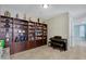 Built-in bookcases, piano, and decorative items at 24002 S 201St Ct, Queen Creek, AZ 85142