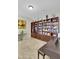Spacious library featuring built-in bookshelves and a piano at 24002 S 201St Ct, Queen Creek, AZ 85142