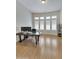 Bright home office with wood floors and built in shelving at 24002 S 201St Ct, Queen Creek, AZ 85142