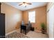 Bedroom with desk and chair, offering a home office setup at 4718 E Thunderheart Trl # 103, Gilbert, AZ 85297