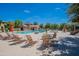 Resort-style pool with a spa and lounge area at 4718 E Thunderheart Trl # 103, Gilbert, AZ 85297