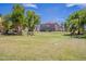 Outdoor volleyball court with a grassy area and trees nearby at 4718 E Thunderheart Trl # 103, Gilbert, AZ 85297