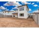 New construction home featuring a large, blank backyard awaiting landscaping at 4918 W Beryl Ave, Glendale, AZ 85302