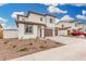 Charming two-story home with neutral colors, a three-car garage, and manicured landscaping at 4918 W Beryl Ave, Glendale, AZ 85302