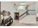 Spacious entry with a staircase and light-filled interior at 6444 E Paradise Ln, Scottsdale, AZ 85254