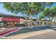 Retail center exterior showcasing restaurants with outdoor seating at 6444 E Paradise Ln, Scottsdale, AZ 85254
