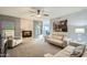 Spacious living room boasts a fireplace, comfortable seating, and large artwork at 6444 E Paradise Ln, Scottsdale, AZ 85254