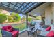 Covered patio with seating area and pool view at 6444 E Paradise Ln, Scottsdale, AZ 85254