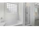 Bathroom features a soaking tub and walk-in shower at 6903 W Irwin Ave, Laveen, AZ 85339