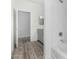 Clean bathroom with gray vanity and a bathtub at 6903 W Irwin Ave, Laveen, AZ 85339