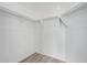 Large walk-in closet with shelving and hanging rods at 6903 W Irwin Ave, Laveen, AZ 85339