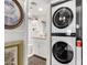 Bathroom with stackable washer and dryer at 7970 E Camelback Rd # 101, Scottsdale, AZ 85251