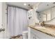 Bathroom with shower/tub combo and white vanity at 7970 E Camelback Rd # 101, Scottsdale, AZ 85251