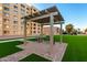 Relaxing gazebo with seating in a landscaped area at 7970 E Camelback Rd # 101, Scottsdale, AZ 85251