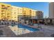 Outdoor pool with lounge chairs and patio area at 7970 E Camelback Rd # 101, Scottsdale, AZ 85251