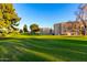 View of the green and building at 7970 E Camelback Rd # 101, Scottsdale, AZ 85251