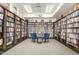 Community library with ample bookshelves and seating at 7970 E Camelback Rd # 101, Scottsdale, AZ 85251