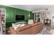 Open living area with a stylish green wall and comfortable seating at 7970 E Camelback Rd # 101, Scottsdale, AZ 85251
