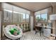 Private patio with comfortable seating and a work area at 7970 E Camelback Rd # 101, Scottsdale, AZ 85251