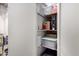 Indoor storage with shelving for various items at 7970 E Camelback Rd # 101, Scottsdale, AZ 85251