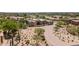 Charming desert home with lush greenery and a winding driveway, nestled in the Arizona landscape at 8300 E Dixileta Dr # 281, Scottsdale, AZ 85266