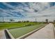 Bocce ball court with green surface and concrete border at 1342 E Verde Blvd, Queen Creek, AZ 85140