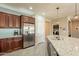 Spacious kitchen with granite countertops, stainless steel appliances, and ample cabinetry at 1342 E Verde Blvd, Queen Creek, AZ 85140