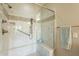 Large walk-in shower with tiled seat and glass enclosure at 1342 E Verde Blvd, Queen Creek, AZ 85140