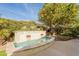 Serene water feature with cascading water and lush landscaping at 1342 E Verde Blvd, Queen Creek, AZ 85140