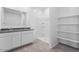 Modern bathroom features double vanity, granite countertops, and a bright shower at 1551 E Mason Dr, Casa Grande, AZ 85122