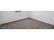 Bright bedroom featuring neutral walls and gray carpet at 1551 E Mason Dr, Casa Grande, AZ 85122