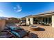 Entertaining backyard with firepit and grill at 18865 W Mescal St, Surprise, AZ 85388